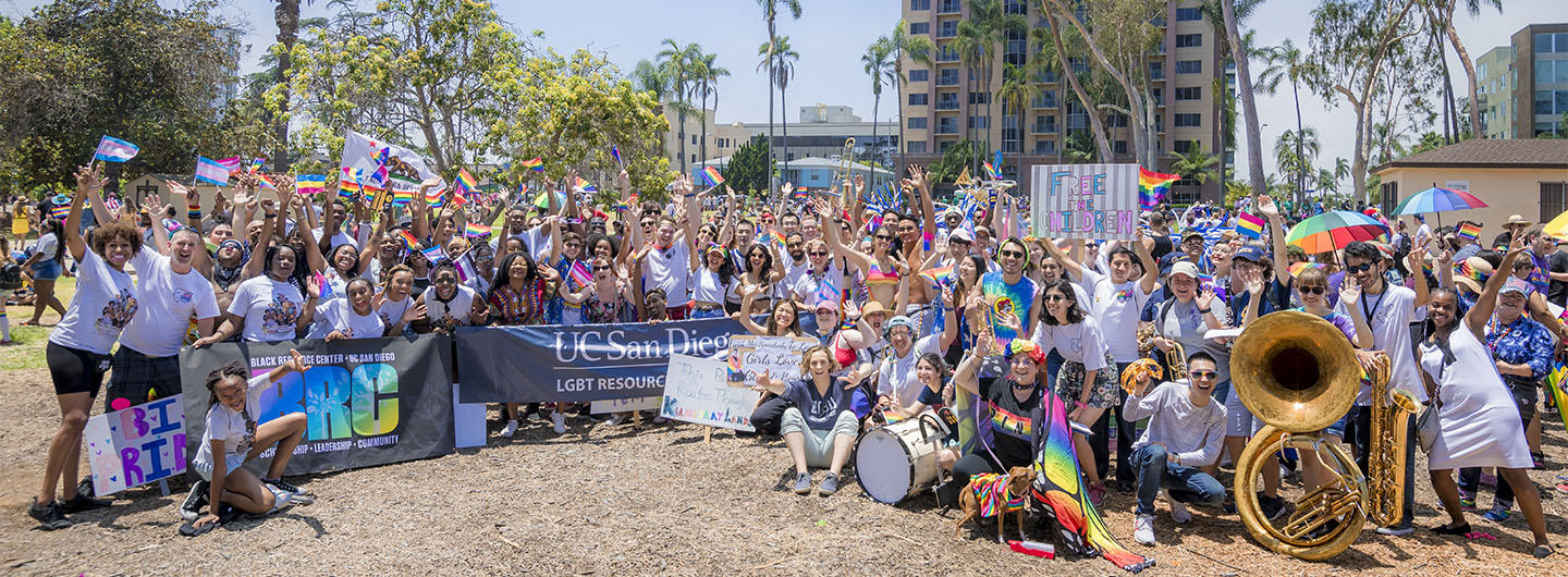 UC San Diego LGBT Resource Center community members and friends pose for a large group photo as they celebrate after the annual Pride Parade in Balboa Park